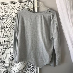 Grey athletic sweatshirt with zippered side